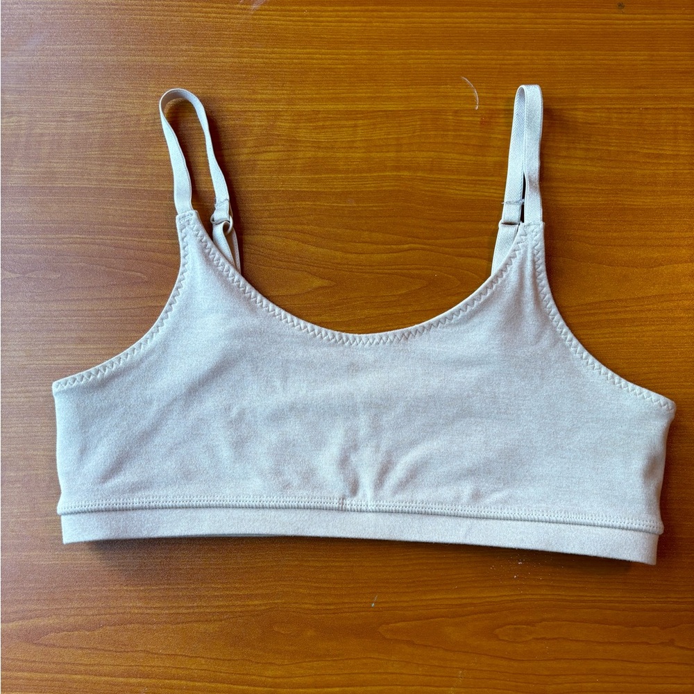 Cream Ivivva sports bra.